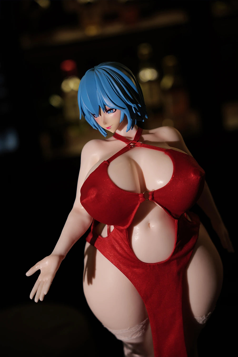Close-up shot of the Akeno anime sex doll, showing the details of her revealing red outfit.