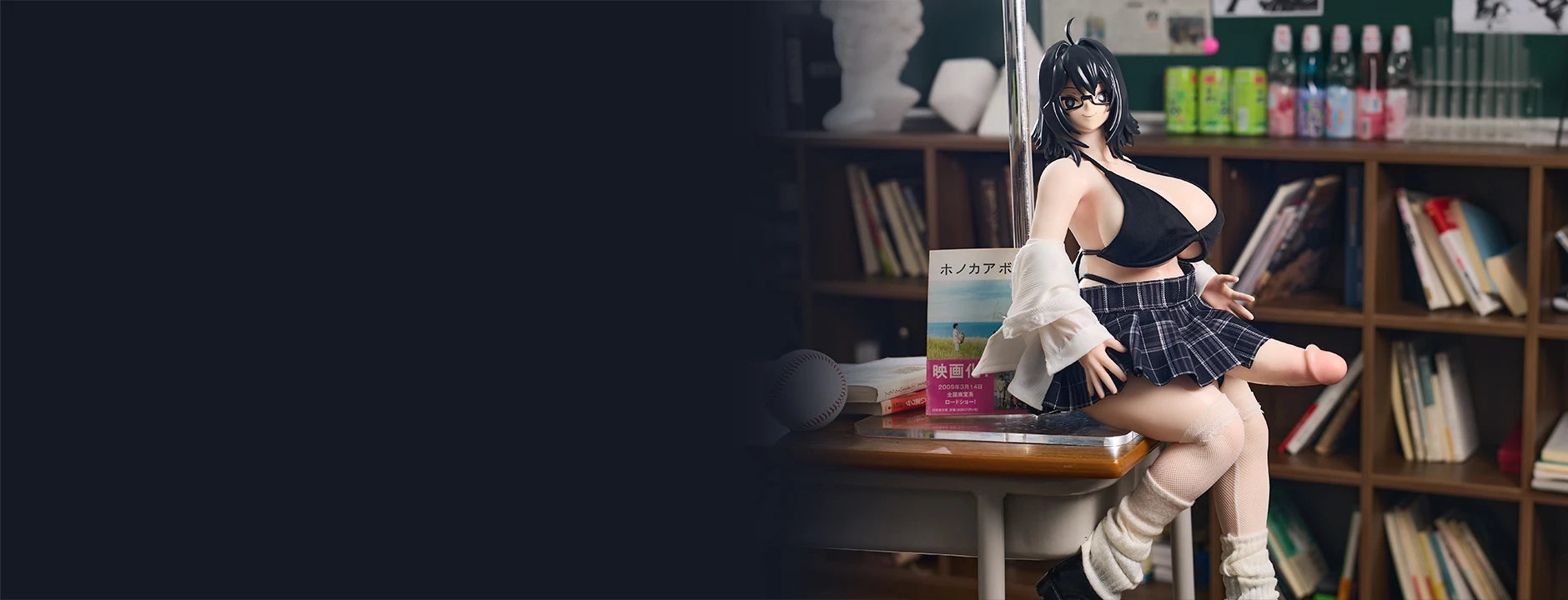 A big tits milf anime sex doll from Sinesian, posed sitting on a desk in a classroom.