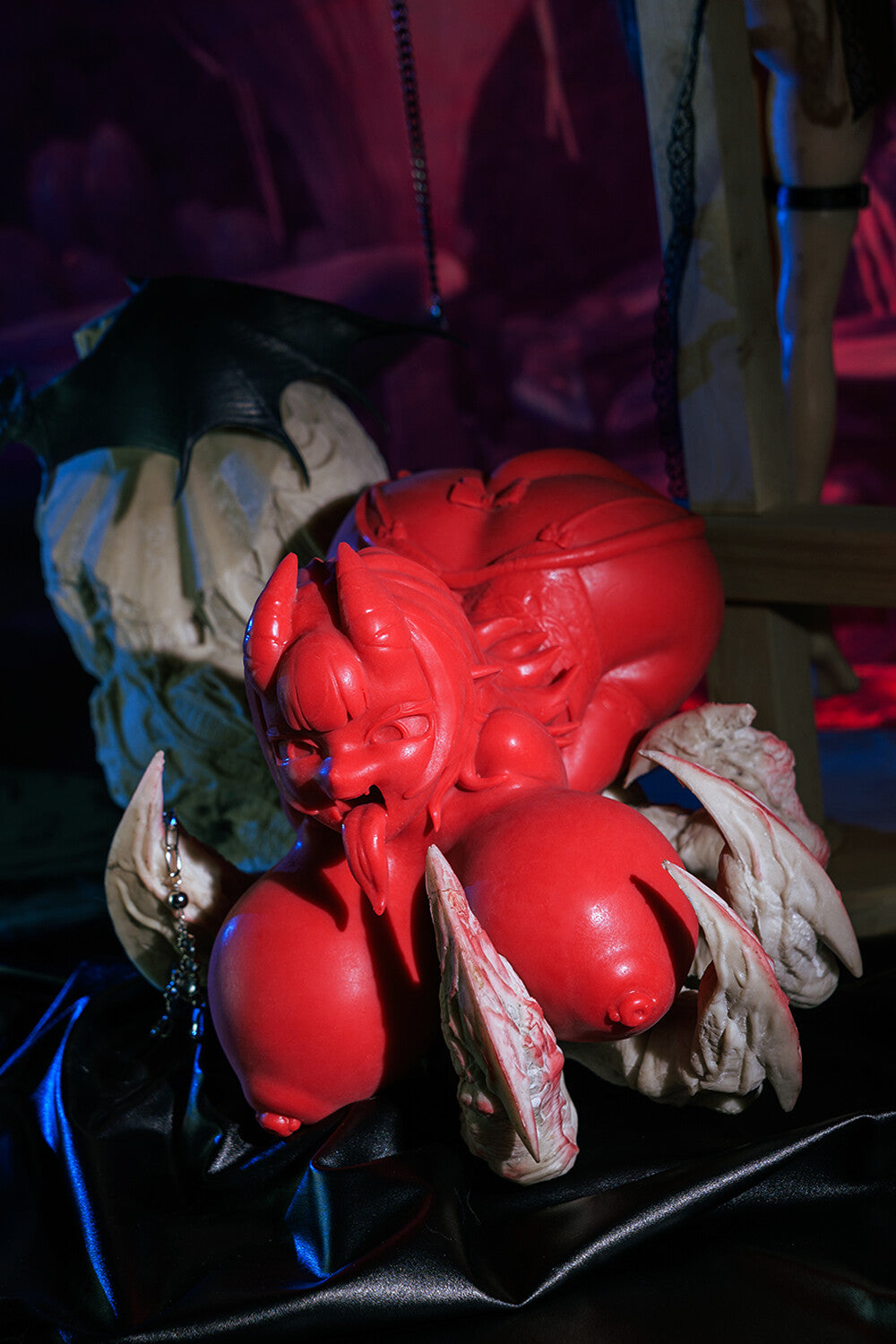 Image of Full view of the red Meru succubus sex doll with big tits.